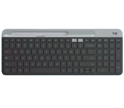 Overhead shot of the graphite Logitech K580 slim wireless keyboard, featuring a built-in phone/tablet cradle, full-size layout with numeric keypad, and dual-connectivity indicators.