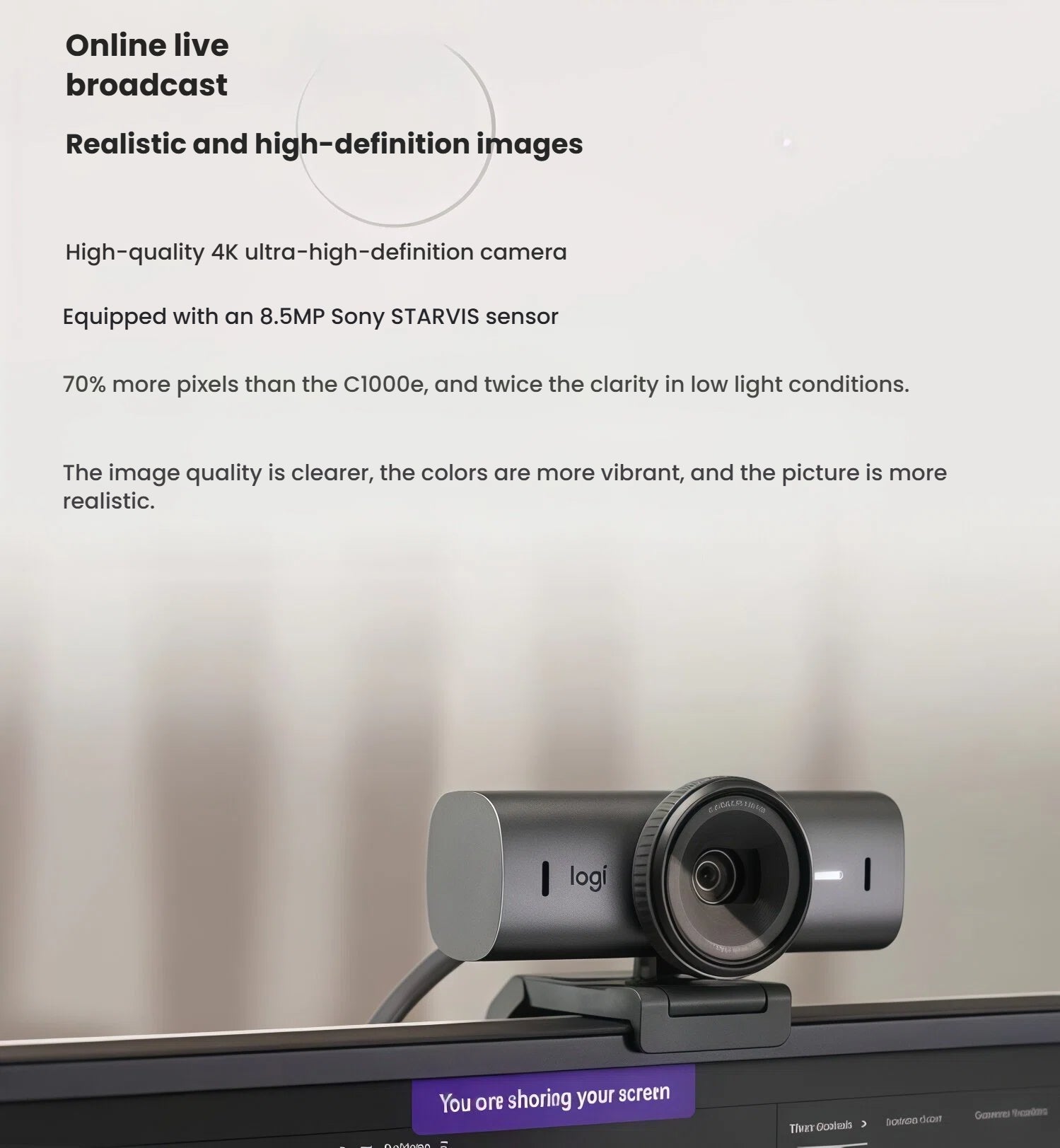 MX Brio 4K webcam clipped to a monitor during a live stream, illustrating 70 % more pixels than C1000e and twice the low-light clarity for realistic, vibrant video.
