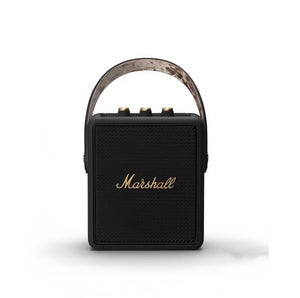 Front view of the Marshall Stockwell II portable wireless speaker in black with camouflage-pattern carry strap, highlighting its rugged, travel-ready style.