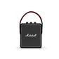 Front view of the Marshall Stockwell II portable wireless speaker in black with red carry strap, showcasing the classic Marshall logo and compact square design.
