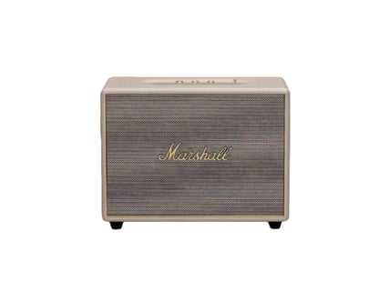  Front view of the Marshall Woburn III wireless Bluetooth speaker in cream, showcasing the iconic gold script logo and textured fret grille.