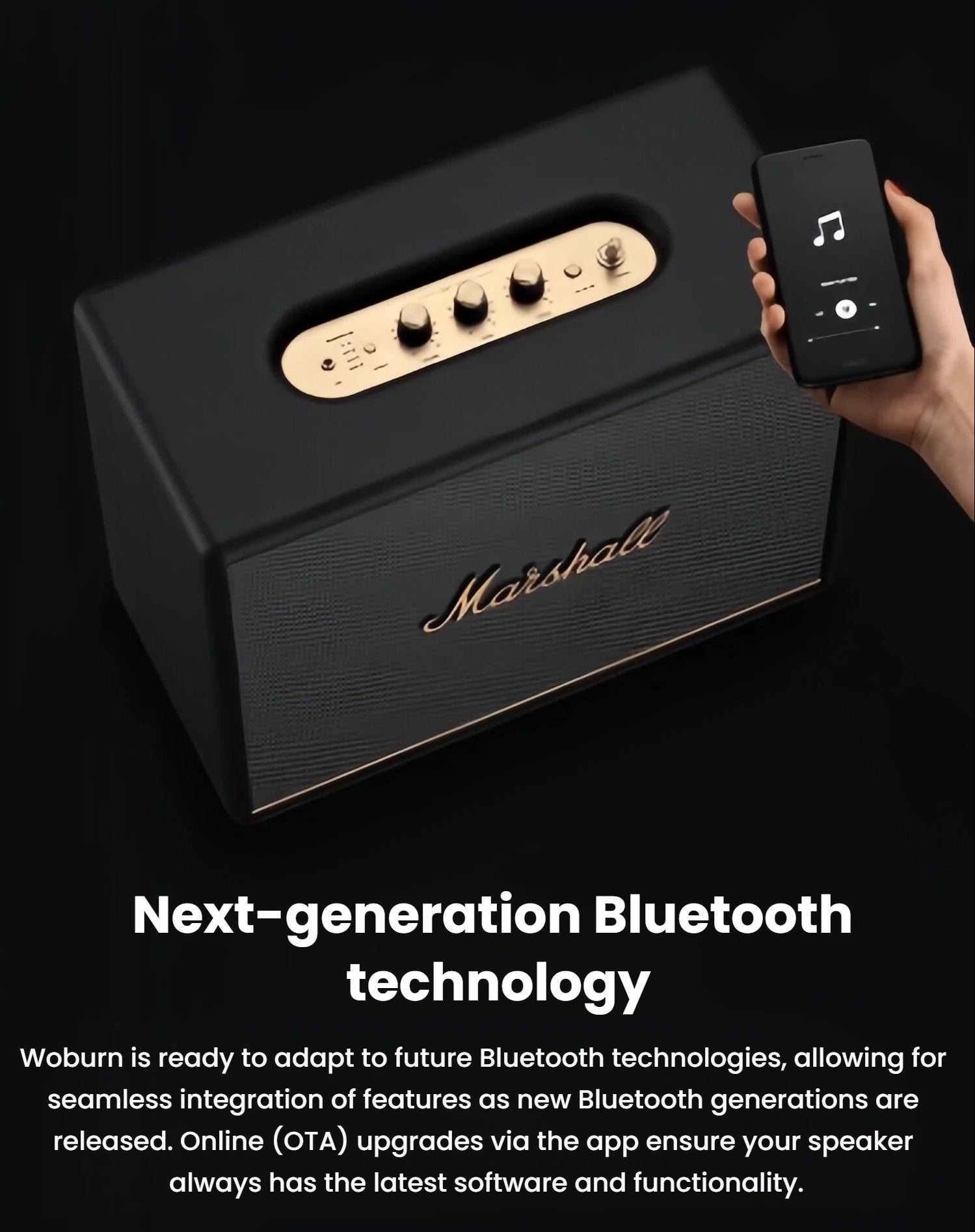  Hand holding a smartphone pairing with the Marshall Woburn III speaker, illustrating next-generation Bluetooth 5.2 connectivity and future-proof OTA upgrades.