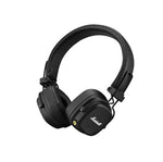 Side-angle shot of Marshall Major IV wireless on-ear headphones highlighting the iconic Marshall script logo, ergonomic design, and matte black finish with gold hardware details.