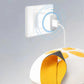 Close-up of Medela Solo breast pump being charged via USB-C port. One charge allows up to 6 pumping sessions per side. Highlighting upgraded battery life and cordless convenience.