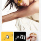 Lifestyle photo of a model wearing NOTHING Ear (a) with bold yellow sunglasses, emphasizing the premium sound quality, powerful 11mm dynamic driver, bass enhancement algorithm, and pure audio experience.
