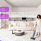 A woman using the Narwal S20 Pro cordless vacuum effortlessly in a spacious, modern living room and kitchen area. Text highlights its long battery life of up to 60 minutes and its capability to clean large areas up to 4,300 square feet on a single charge.