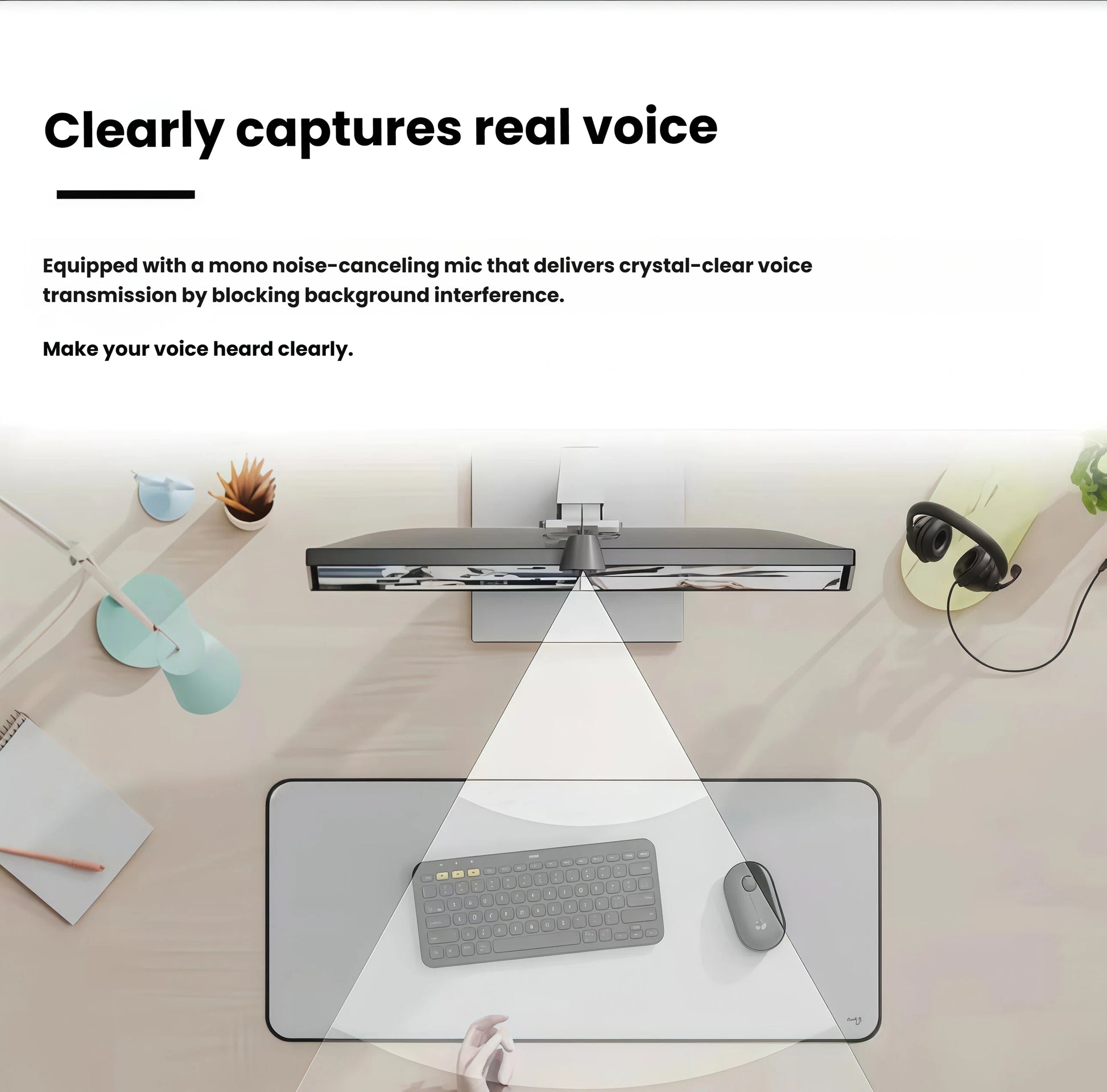 Overhead desk scene with the black Brio 300 centered on a monitor; a graphic cone illustrates the directional, noise-canceling microphone capturing the user’s voice.