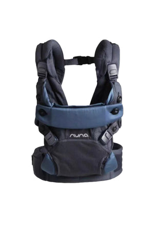 Studio shot of Nuna Cudl Clik Carrier in navy blue color—showing padded shoulder straps, magnetic chest buckle, and breathable mesh panels. Ideal for everyday babywearing from birth to toddler.