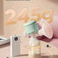 October Crystal portable breast pump weighing 245g displayed next to a power bank; USB-C charging cable connected, showing compatibility with laptops, adapters, and portable chargers