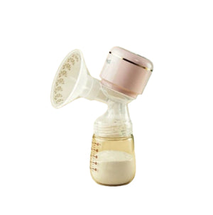 October Crystal portable electric breast pump in soft pink color; all-in-one design with floral-patterned flange, transparent milk bottle containing expressed milk, ideal for discreet and comfortable pumping