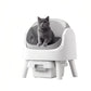 PetPivot self-cleaning cat litter box with gray basin and white exterior — British Shorthair cat seated comfortably, highlighting low-stress open design