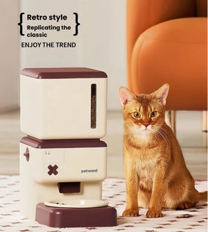 Petwant retro Wi-Fi pet feeder placed beside a ginger cat in a cozy living room — combining classic design with smart feeding technology for cats and small dogs