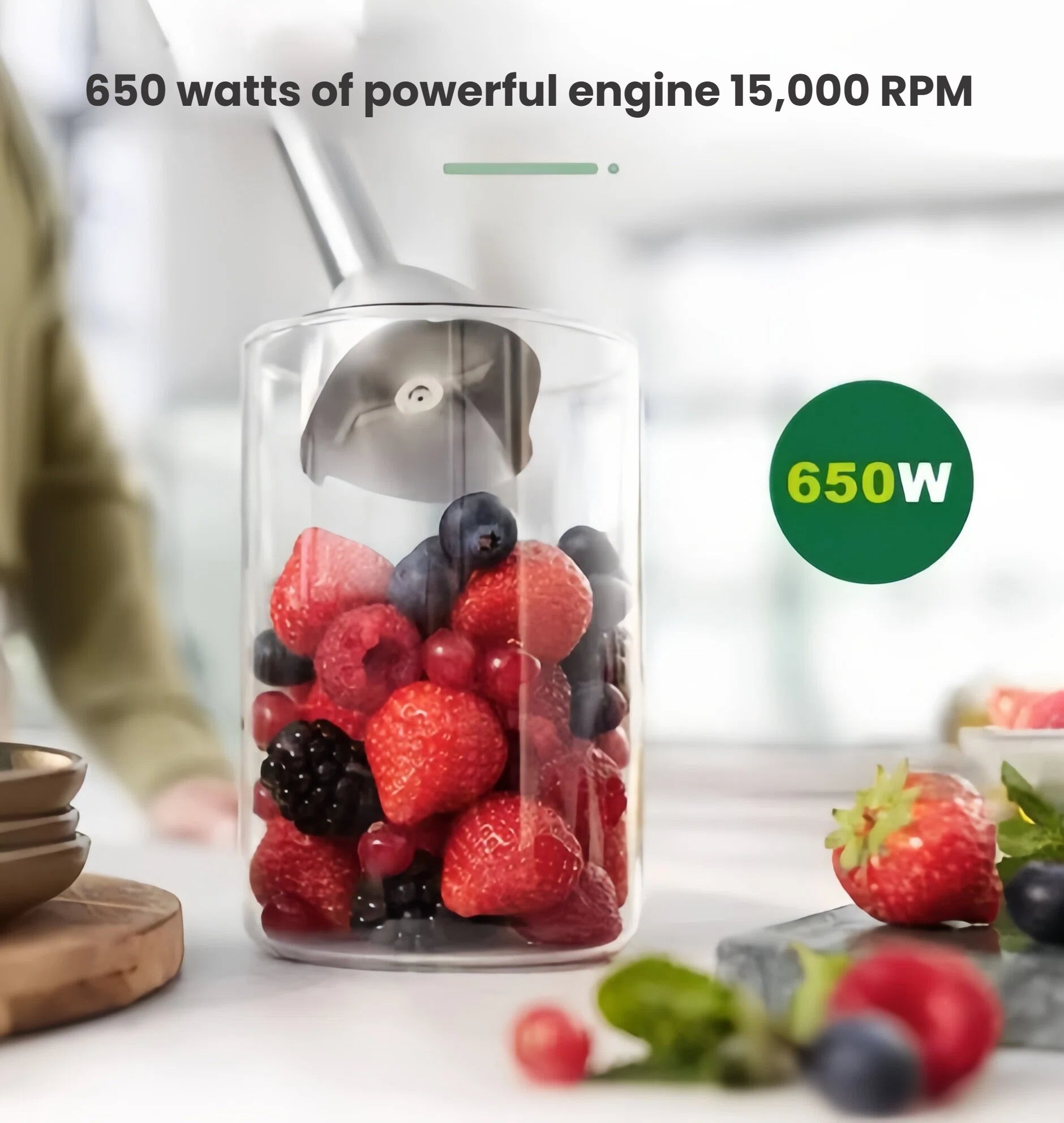 Philips Avent handheld blender blending fresh strawberries, blueberries, and blackberries in a transparent 250ml cup—perfect for homemade baby food or smoothies