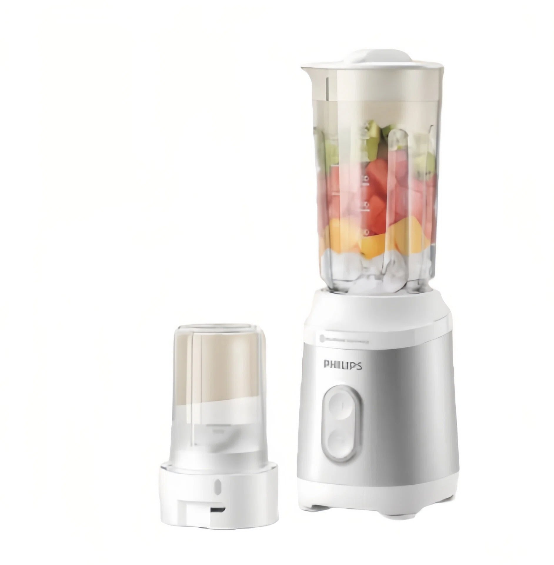 Philips Avent compact baby food maker featuring a 600ml blending jar filled with fresh fruits and a detachable mini grinder cup—ideal for smooth purees, juices, and grinding grains.