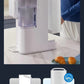 The Philips desktop water machine with its large, removable water tank being lifted out, with a graphic below comparing the 4L and 6L capacity options.
