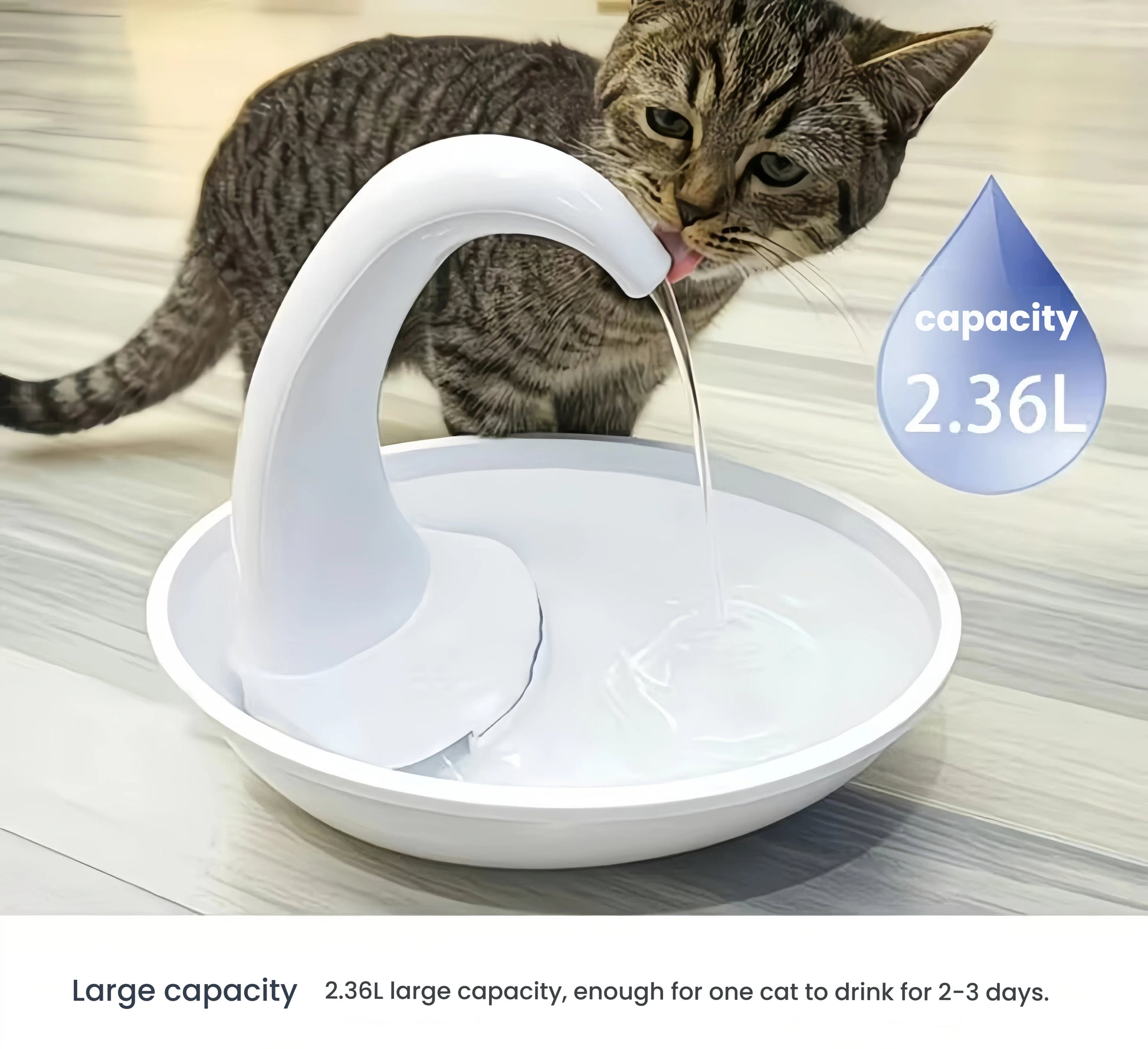 Cat drinking from Pioneer Pet swan water fountain with 2.36L capacity — large reservoir provides fresh water for 2–3 days without refilling