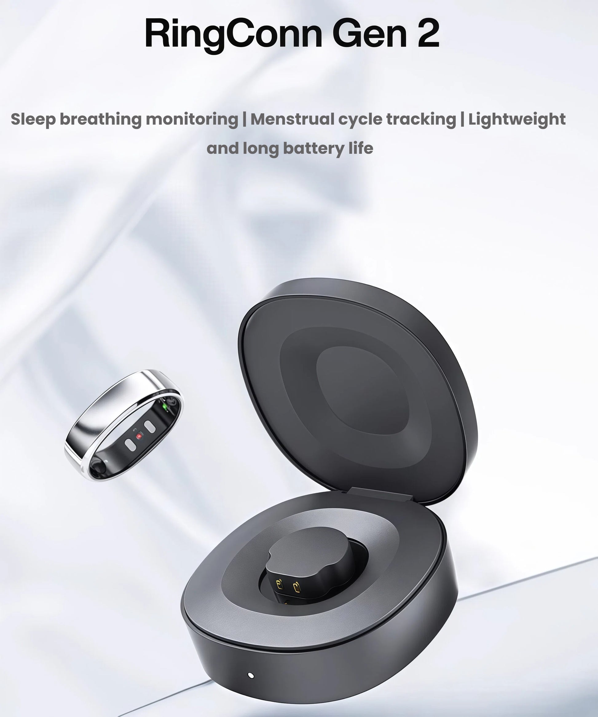 Silver RingConn Gen 2 ring hovering above its sleek black charging case, highlighting on-the-go charging and advanced health features.
