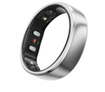 Close-up of the silver RingConn Gen 2 ring’s inner surface, revealing green and red optical sensors and titanium alloy shell.