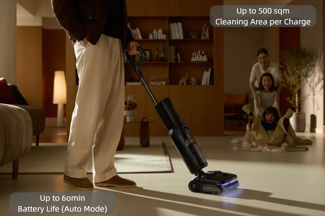 A man using the Roborock F25 Ultra in a family living room, highlighting its extensive battery life of up to 60 minutes and its large cleaning area coverage of up to 500 square meters on a single charge.