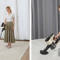 A two-panel image demonstrating the Roborock H5's user-friendly features. The left shows a woman cleaning a living room, highlighting the up to 60 minutes of battery life. The right shows her cleaning a mattress, emphasizing the low noise level of 68.9 dB.