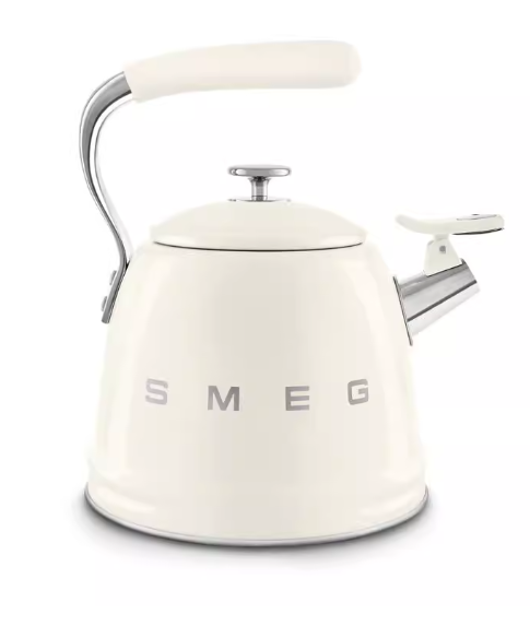 A beautiful pastel blue SMEG 50's Style Stovetop Whistling Kettle. This Italian-designed tea kettle is compatible with all stovetops, including gas and induction.