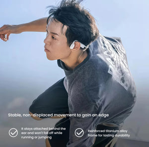 Man running outdoors with Shokz OpenMove headphones securely attached behind the ear — reinforced titanium alloy frame ensures durability and non-slip fit during motion.