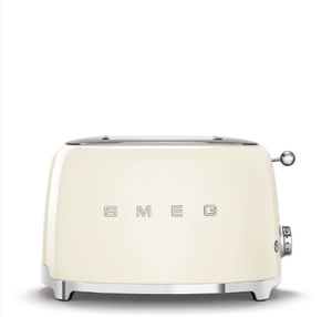  The iconic Smeg 50's Style 4-Slice Toaster shown from the front in a classic cream finish with a polished chrome base and SMEG logo, on a clean white background.