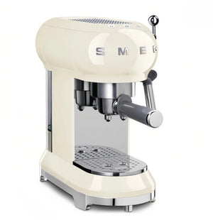 The iconic Smeg 50's Style Espresso Coffee Machine (ECF02WHAU) in a retro cream finish, shown from a front-three-quarters angle with its portafilter in place on a clean white background.