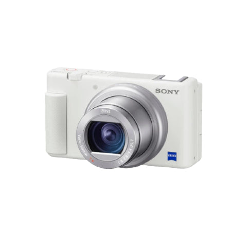  Front view of the Sony Cyber-shot ZV-1 vlog camera in white, featuring the Zeiss Vario-Sonnar T* 24-70 mm lens and compact body for content creators.