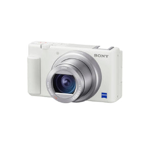  Front view of the Sony Cyber-shot ZV-1 vlog camera in white, featuring the Zeiss Vario-Sonnar T* 24-70 mm lens and compact body for content creators.