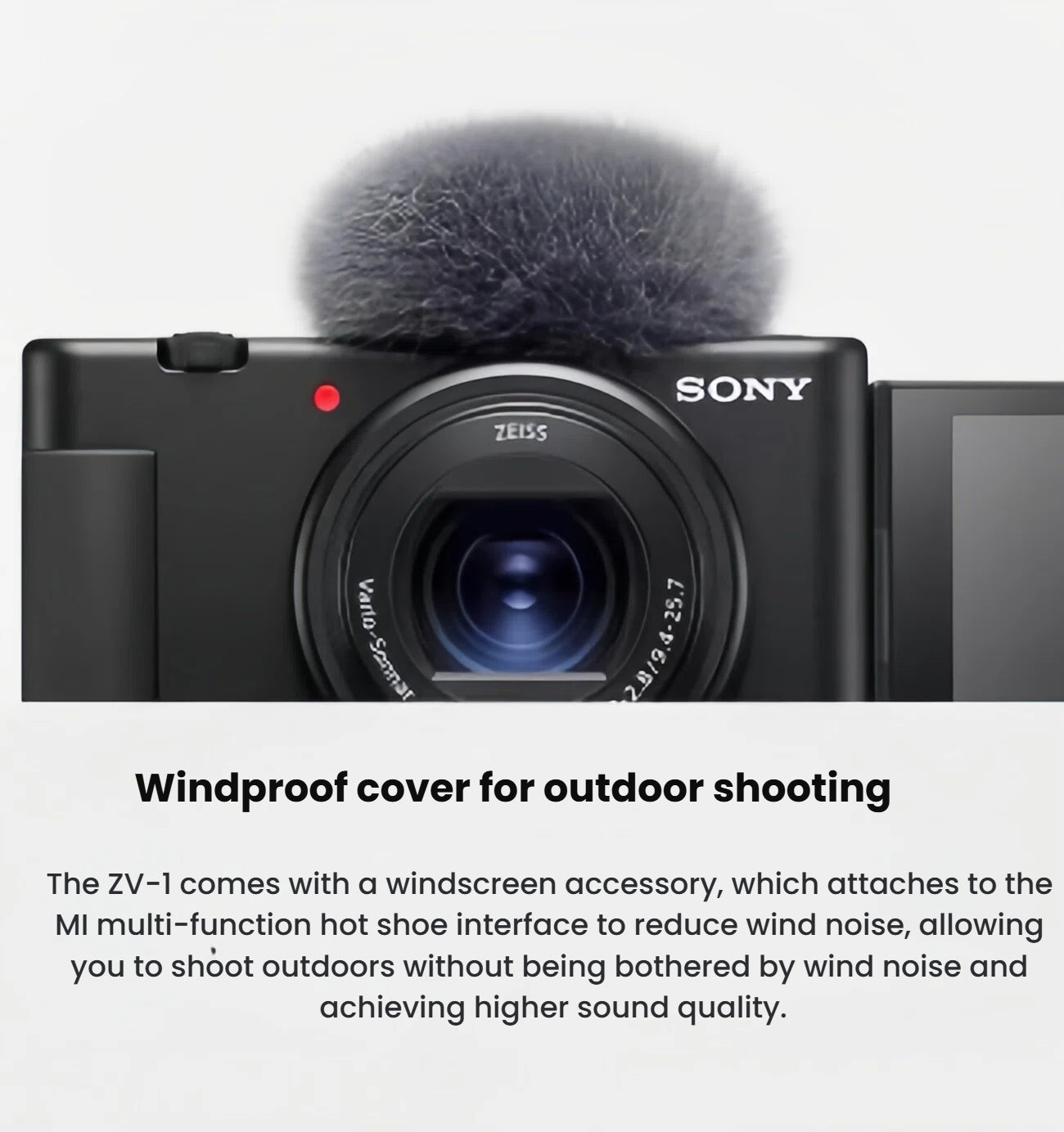 Close-up of the Sony ZV-1 camera with the supplied windscreen attached to the Multi-Interface Shoe, minimizing wind noise during outdoor vlogging.