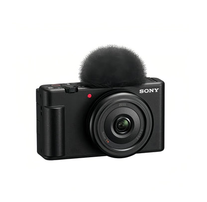 Front view of black Sony ZV-1F 4K vlog camera with 20 mm f/2.0 Zeiss lens and windscreen.