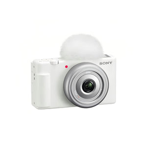 Front view of white Sony ZV-1F 4K vlog camera featuring 20 mm f/2.0 Zeiss lens and built-in windscreen.