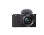  Front view of black Sony ZV-E10 mirrorless vlog camera with 16-50 mm lens and included windproof microphone.