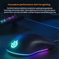 Top-down shot of the SteelSeries Rival 5 gaming mouse with dynamic RGB lighting glowing along the edges and logo. Designed for high-performance gaming, it features a contoured ergonomic shape for comfortable grip during extended use.
