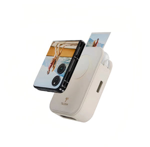 Close-up of TELESIN magnetic printer case attached to a flip smartphone. The device prints a photo while maintaining a sleek, retro-inspired design perfect for modern instant photography.
