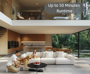 A family with their dog enjoys a clean, modern home while the Tineco FLOOR ONE S7 Stretch cordless vacuum demonstrates its powerful cleaning capabilities, highlighting its impressive runtime of up to 50 minutes.