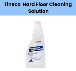Front view of the Tineco Hard Floor Cleaning Solution bottle, a 32 FL OZ (946mL) deodorizing and cleaning formula designed for use with Tineco robotic mops. The white bottle features a blue label with "Deodorizing & Cleaning Solution" branding and a splash graphic, highlighting its effectiveness on tile, hardwood, laminate, and vinyl floors.