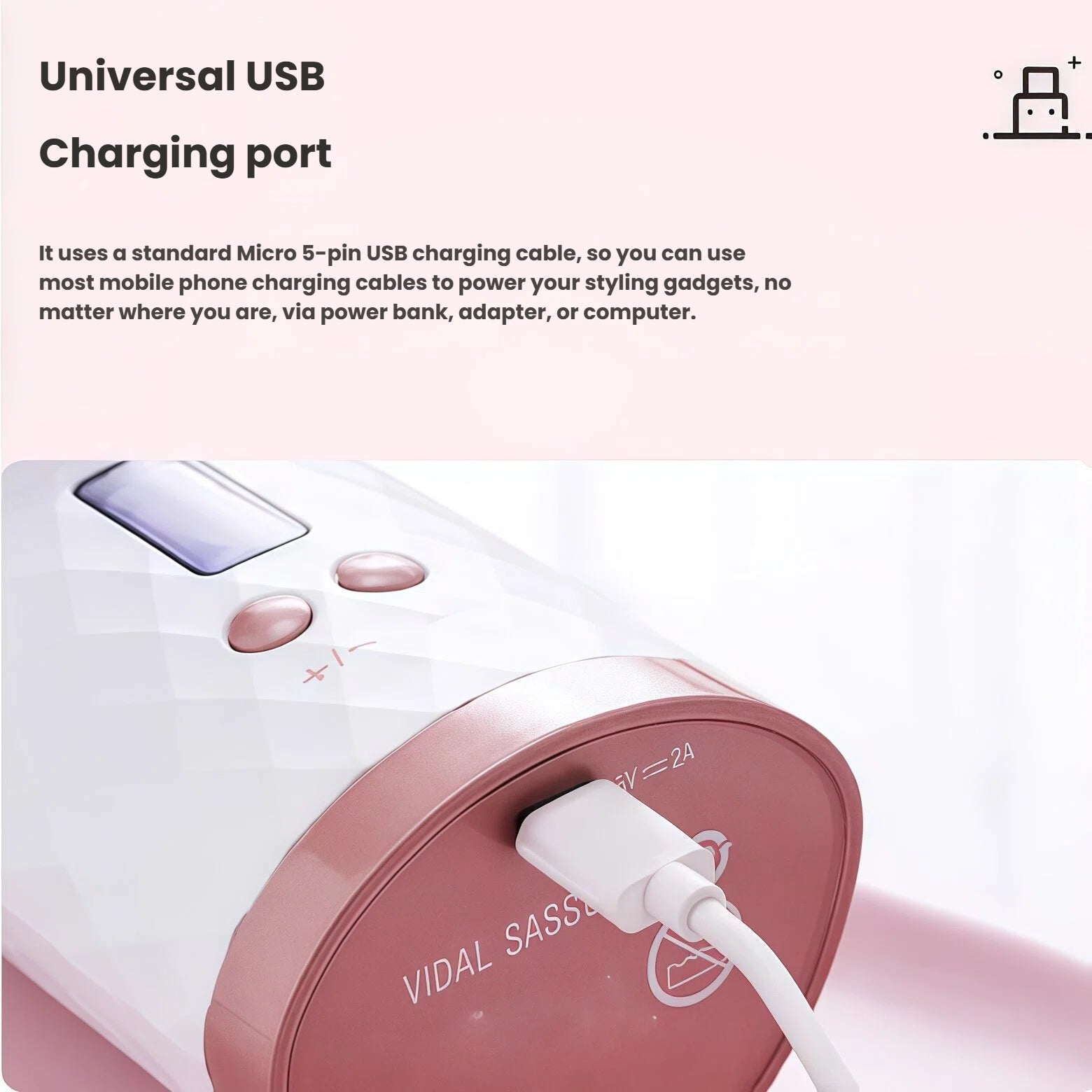 Close-up of the VS Unbound Shine-Pro auto curler’s bottom with a Micro USB charging cable inserted. Uses standard 5-pin USB cable for convenient charging via power bank, adapter, or computer.