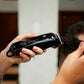 Wahl Cordless Hair Clipper being used for a haircut, demonstrating its functionality and design.