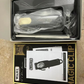 Open box of Wahl Hair Clipper with accessories neatly arranged, emphasizing the product's professional quality.