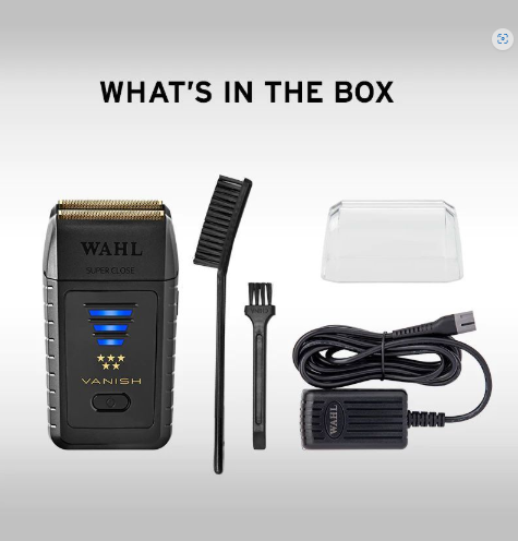 Contents of the Wahl Shaver box displayed, including the shaver, comb, charging cord, and cleaning brush.