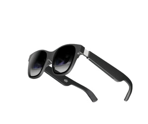 Studio shot of folded black XREAL Air 2 AR glasses, highlighting sleek, travel-ready design.