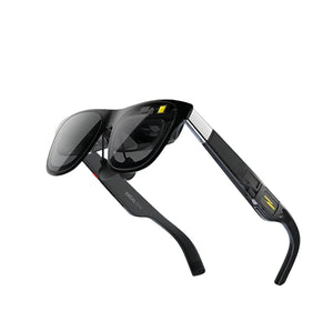 Studio shot of black XREAL One AR glasses with tinted lenses and metallic accents.