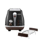 De'Longhi lcona Capitals 2 Slice De'Longhi Icona Vintage 2-Slice Toaster in high-gloss black with its separate chrome pastry warming rack displayed alongside.