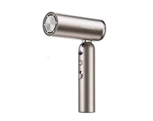 The Dreame Pocket high-speed portable hair dryer in a sleek metallic finish, showcasing its compact and foldable design against a white background.