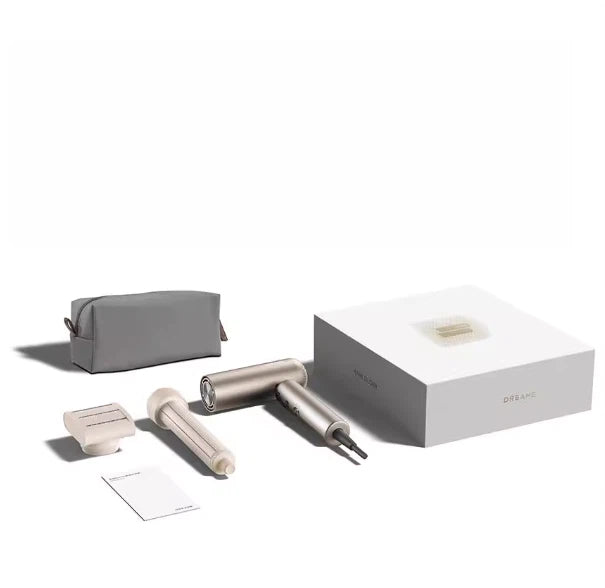  Everything included in the Dreame Pocket hair dryer box: the foldable dryer, a styling nozzle, a travel pouch, and the product packaging.