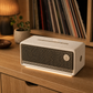 Edifier ES60 ivory Bluetooth speaker on a record shelf