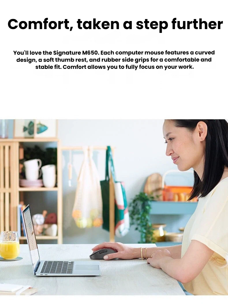 Logitech Signature M650 wireless mouse on desk productivity setup