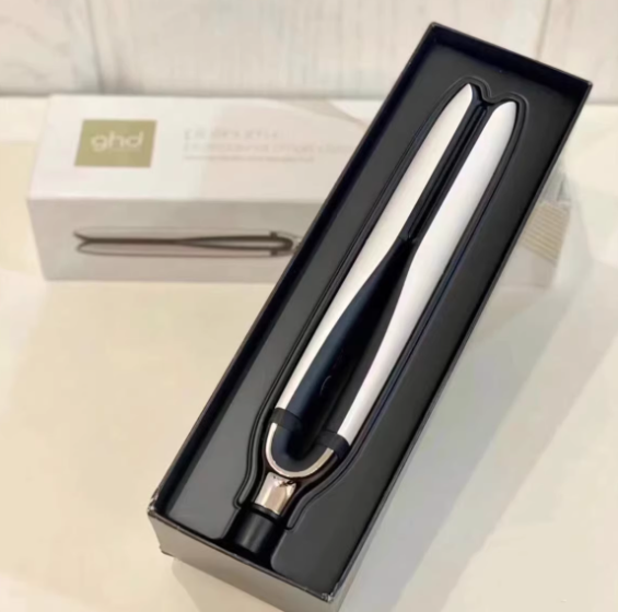 ghd Platinum+ Smart Styler in black presentation box with white model inside. Elegant packaging includes branded box and protective sleeve—perfect for gifting or travel.